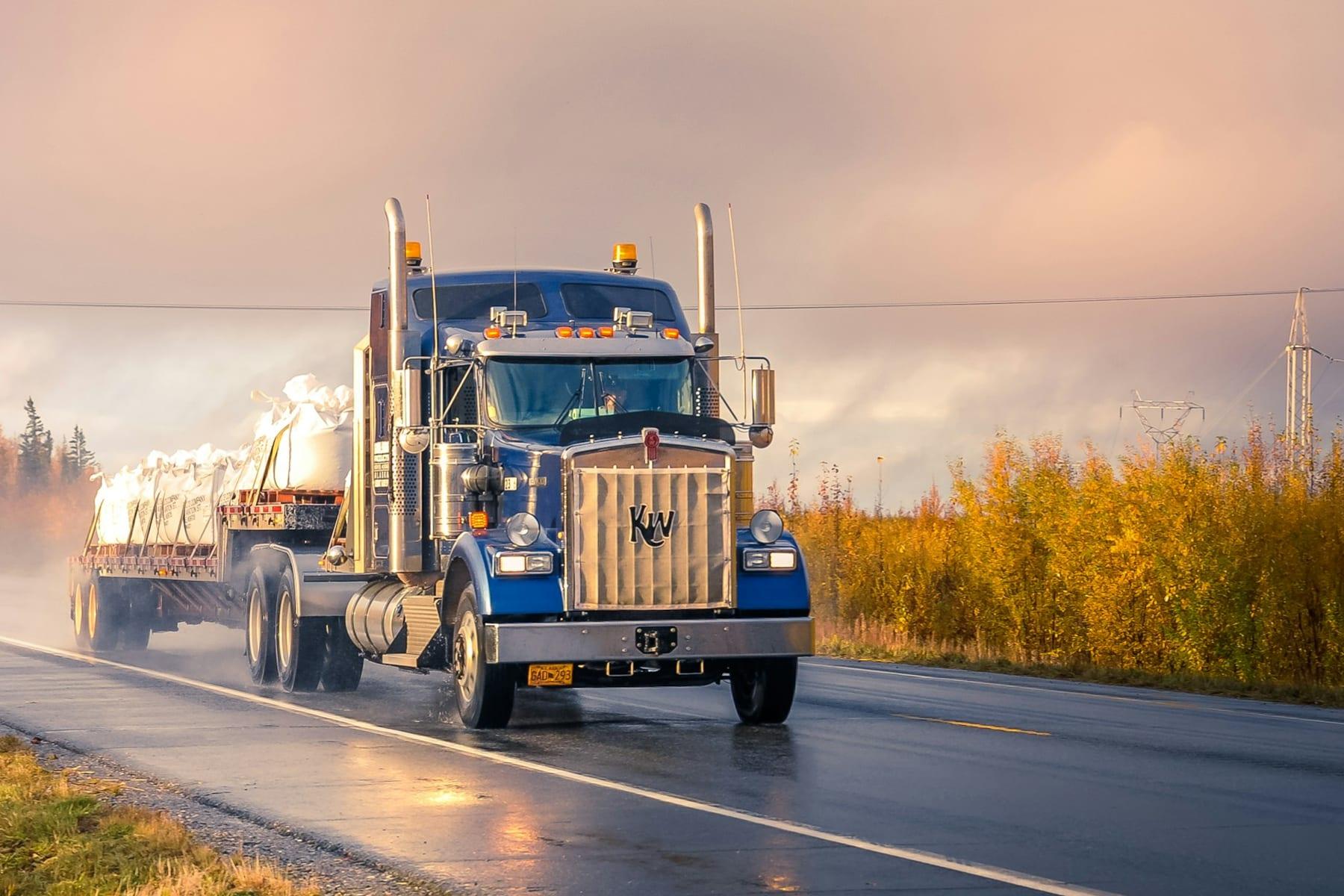 Heavy commercial truck on the road — commercial vehicles Maxcorro builds custom parts for